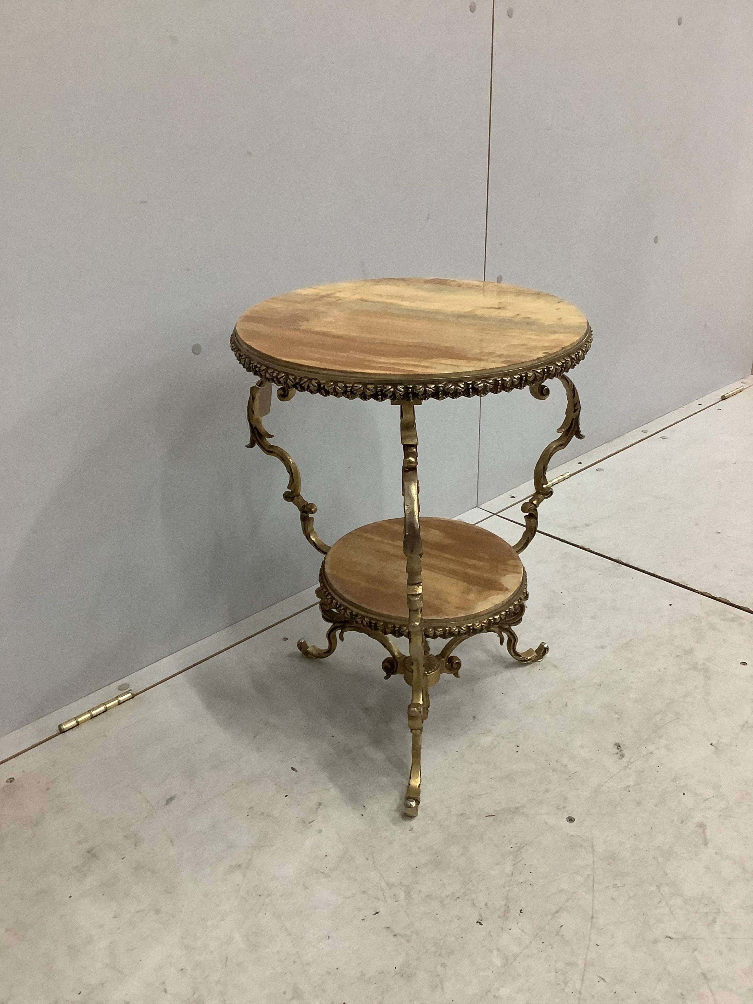 A gilt metal and onyx two tier occasional table, diameter 48cm, height 55cm. Condition - fair